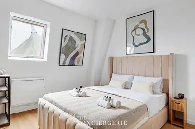 Un ou plusieurs lits dans un hébergement de l'établissement Studio Chic et Cosy - Boulevard Kellermann