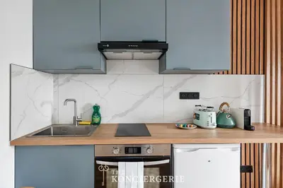 Cuisine ou kitchenette dans l'établissement Studio Chic et Cosy - Boulevard Kellermann