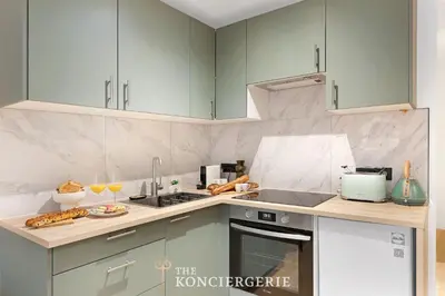 Cuisine ou kitchenette dans l'établissement Elegance parisienne au coeur de Paris - 4 personnes