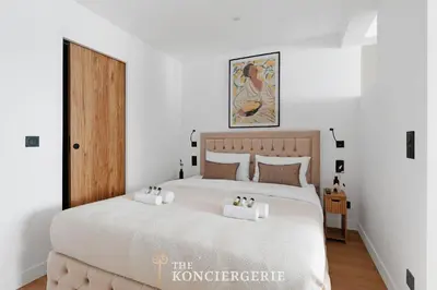 Un ou plusieurs lits dans un hébergement de l'établissement Elegance parisienne au coeur de Paris - 4 personnes