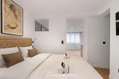 Un ou plusieurs lits dans un hébergement de l'établissement Elegance parisienne au coeur de Paris - 4 personnes