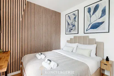 Un ou plusieurs lits dans un hébergement de l'établissement Studio Elegant Redecore - Confort et Calme a Paris