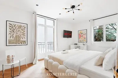 Un ou plusieurs lits dans un hébergement de l'établissement Sejour d'exception a Paris - Appartement raffine pour 4
