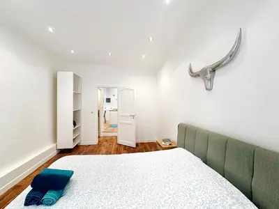 Un ou plusieurs lits dans un hébergement de l'établissement Appartement Chic Paris 16, Proche Tour Eiffel
