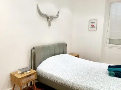 Un ou plusieurs lits dans un hébergement de l'établissement Appartement Chic Paris 16, Proche Tour Eiffel