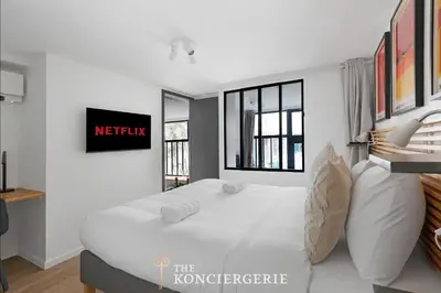 Un ou plusieurs lits dans un hébergement de l'établissement Residence d'Exception Renovee par Architecte - Paris 10