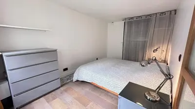 Un ou plusieurs lits dans un hébergement de l'établissement Bright 1-Bedroom in the Heart of the Marais