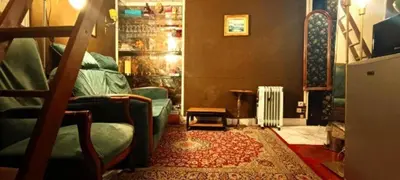 Télévision ou salle de divertissement dans l'établissement A Cozy Parisian Nest by Notre Dame