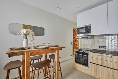 Cuisine ou kitchenette dans l'établissement Apartment in the heart of Paris - Marais
