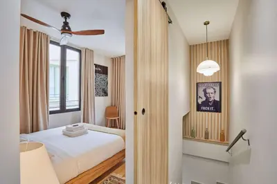 Un ou plusieurs lits dans un hébergement de l'établissement Apartment in the heart of Paris - Marais