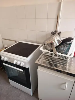 Cuisine ou kitchenette dans l'établissement Visitor's house