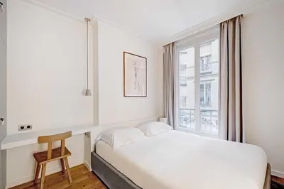 Un ou plusieurs lits dans un hébergement de l'établissement Charming flat -2P- Montmartre