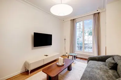 Télévision ou salle de divertissement dans l'établissement Charming flat -2P- Montmartre