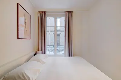 Un ou plusieurs lits dans un hébergement de l'établissement Charming flat -2P- Montmartre