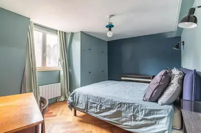 Un ou plusieurs lits dans un hébergement de l'établissement Charming apartment le Marais