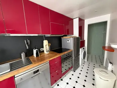 Cuisine ou kitchenette dans l'établissement Charming apartment le Marais