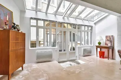Coin salon dans l'établissement Spacious Apartment 1BR 2P – Auteuil