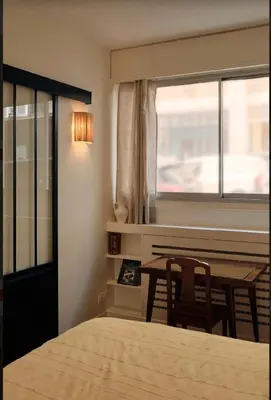 Un ou plusieurs lits dans un hébergement de l'établissement Chic & cosy 2BR - à deux pas Tour Eiffel 2BR
