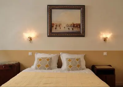 Un ou plusieurs lits dans un hébergement de l'établissement Chic & cosy 2BR - à deux pas Tour Eiffel 2BR