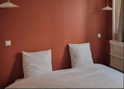 Un ou plusieurs lits dans un hébergement de l'établissement Chic & cosy 2BR - à deux pas Tour Eiffel 2BR