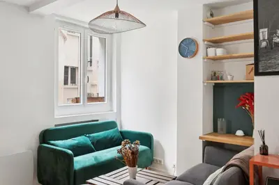 Coin salon dans l'établissement Charmant appartement pour 4 à Paris