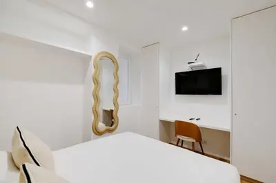 Télévision ou salle de divertissement dans l'établissement Modern apprt 1BR 4P - Paris 2nd