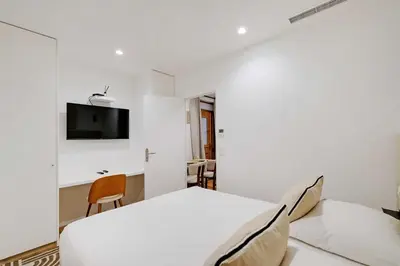Télévision ou salle de divertissement dans l'établissement Modern apprt 1BR 4P - Paris 2nd