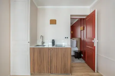 Cuisine ou kitchenette dans l'établissement Suite Tour Eiffel 1 Bedroom