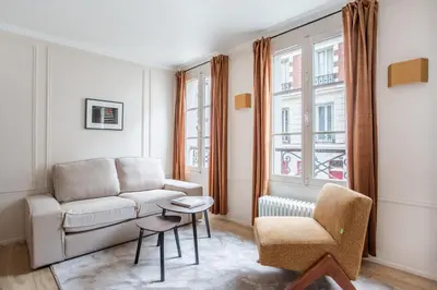 Coin salon dans l'établissement Suite Tour Eiffel 1 Bedroom