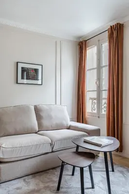 Coin salon dans l'établissement Suite Tour Eiffel 1 Bedroom