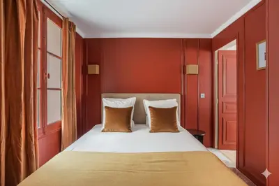Un ou plusieurs lits dans un hébergement de l'établissement Suite Tour Eiffel 1 Bedroom