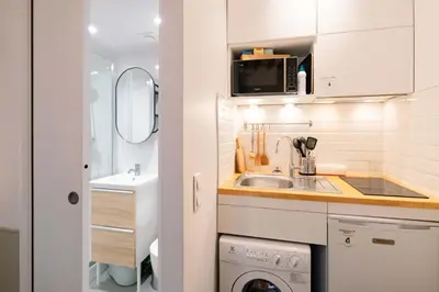 Cuisine ou kitchenette dans l'établissement Charming Studio Montorgueil