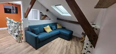 Coin salon dans l'établissement Cozy Loft sous les toits