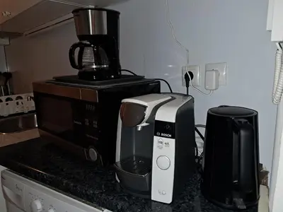 Cuisine ou kitchenette dans l'établissement Charmant Nice apartment in central Paris location !