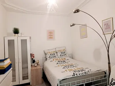 Un ou plusieurs lits dans un hébergement de l'établissement Charmant Nice apartment in central Paris location !