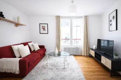Télévision ou salle de divertissement dans l'établissement Cozy Appartement 1 Chambre au 12ᵉ Arrondissement