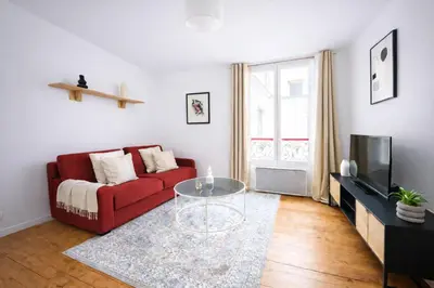 Télévision ou salle de divertissement dans l'établissement Cozy Appartement 1 Chambre au 12ᵉ Arrondissement