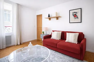 Coin salon dans l'établissement Cozy Appartement 1 Chambre au 12ᵉ Arrondissement