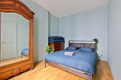 Un ou plusieurs lits dans un hébergement de l'établissement Quartier Luxembourg 1 Bedroom Apartment-Netflix