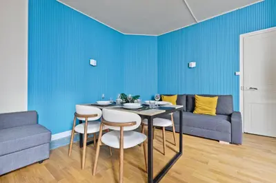 Coin salon dans l'établissement Quartier Luxembourg 1 Bedroom Apartment-Netflix