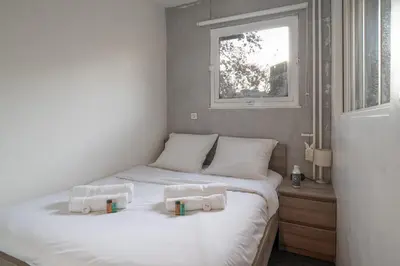 Un ou plusieurs lits dans un hébergement de l'établissement T1bis avec balcon à Boulogne - Welkeys