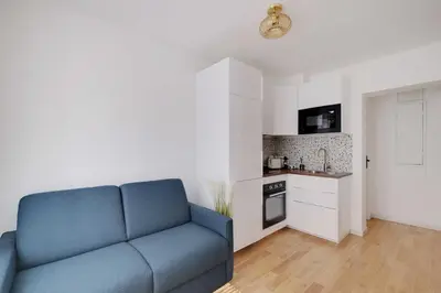 Cuisine ou kitchenette dans l'établissement Charming apartment 1BR 3P - Oberkampf