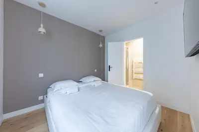 Un ou plusieurs lits dans un hébergement de l'établissement Charming Apartment 4 stars near Montmartre & Metro