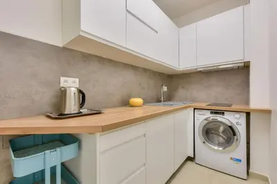 Cuisine ou kitchenette dans l'établissement Bright & Spacious Apartments in Central Paris 15th