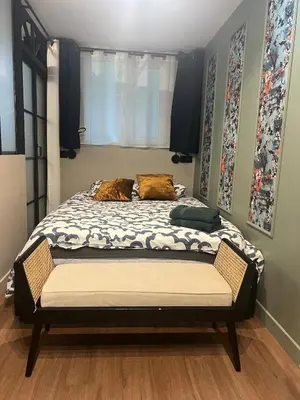 Un ou plusieurs lits dans un hébergement de l'établissement Duchesse flat PARIS center lovely place B2