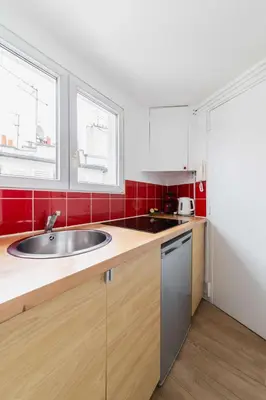 Cuisine ou kitchenette dans l'établissement Agreable studio coeur de paris - Paris 6 - 2P