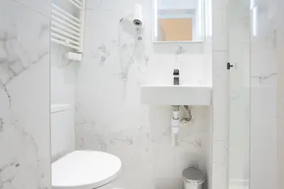 Salle de bains dans l'établissement Charmant appartement centre Paris 2 - 2P