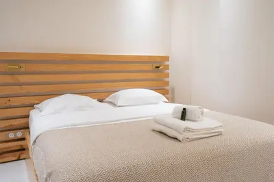 Un ou plusieurs lits dans un hébergement de l'établissement Charmant appartement centre Paris 2 - 2P
