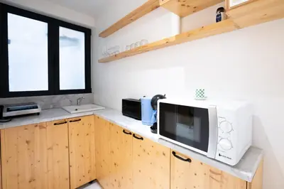 Cuisine ou kitchenette dans l'établissement Charmant appartement centre Paris 2 - 2P