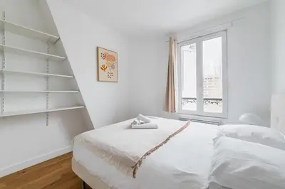 Un ou plusieurs lits dans un hébergement de l'établissement Appartement 60m2 Bien Amenage- Paris 12 - 4p